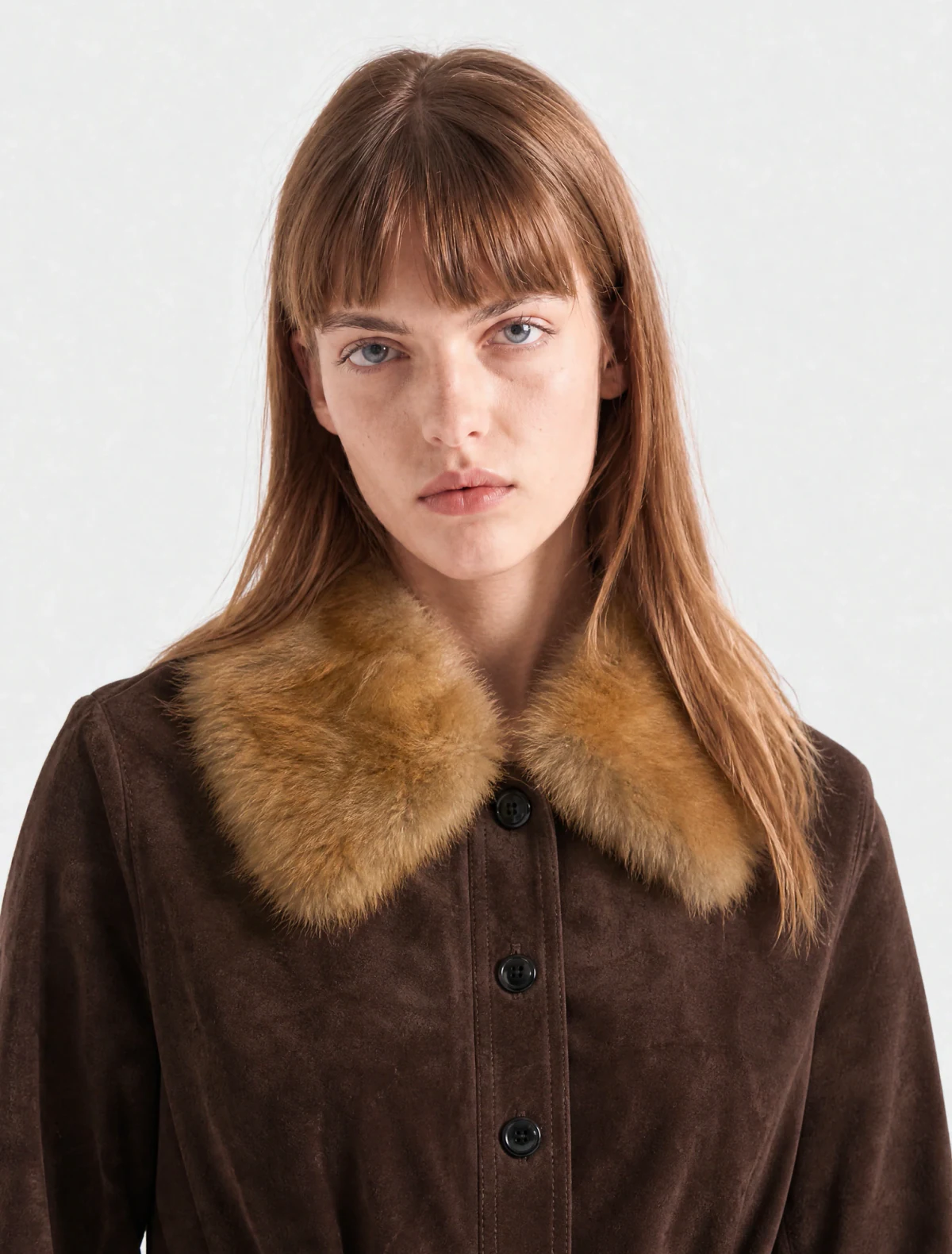 AI-generated on-model image: suede jacket with a fur collar, close-up portrait