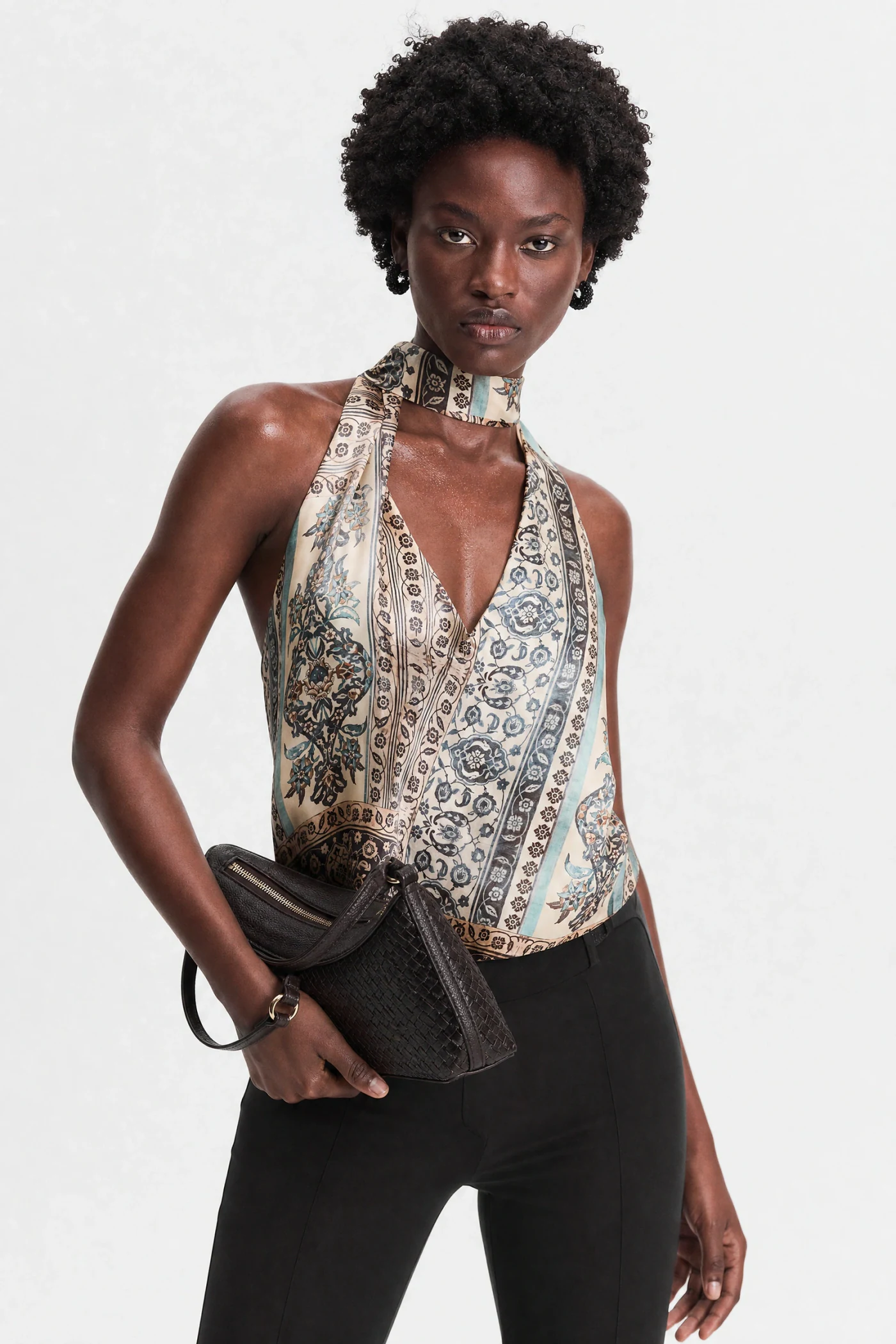 Silk scarf halter top on an AI model in a clean studio setup