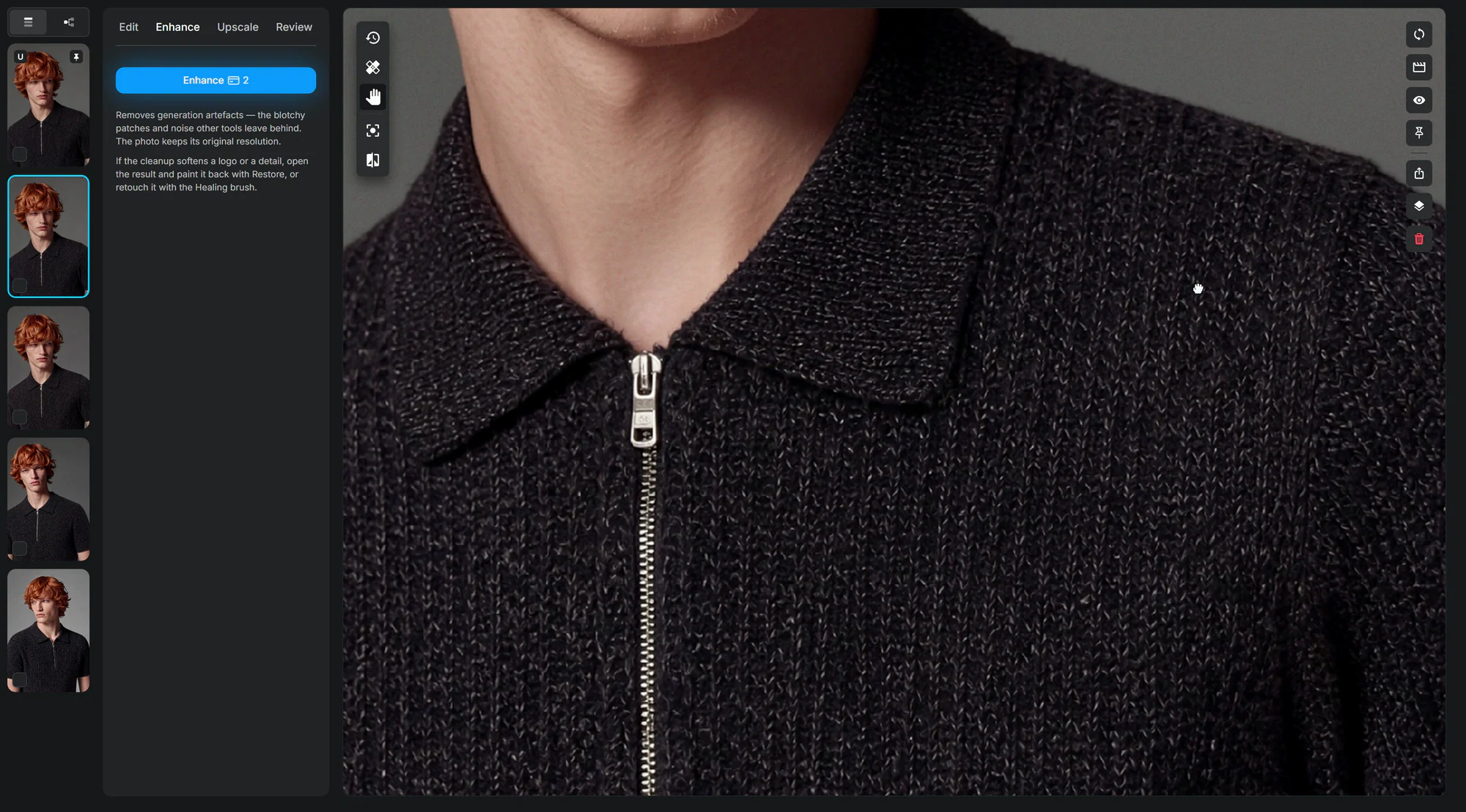 Extreme close-up of a metal zip on a dark knit polo inside the editor