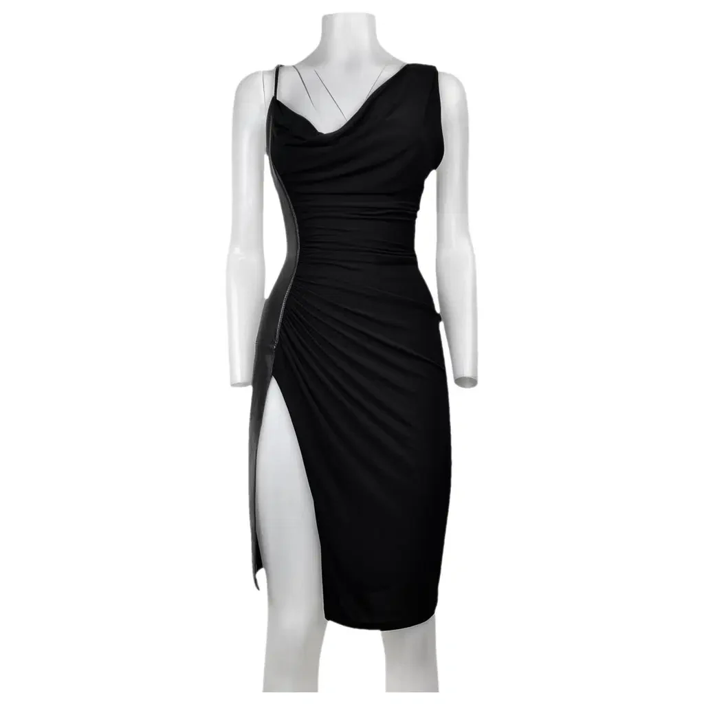 Ghost mannequin shot of a draped black dress with a thigh slit