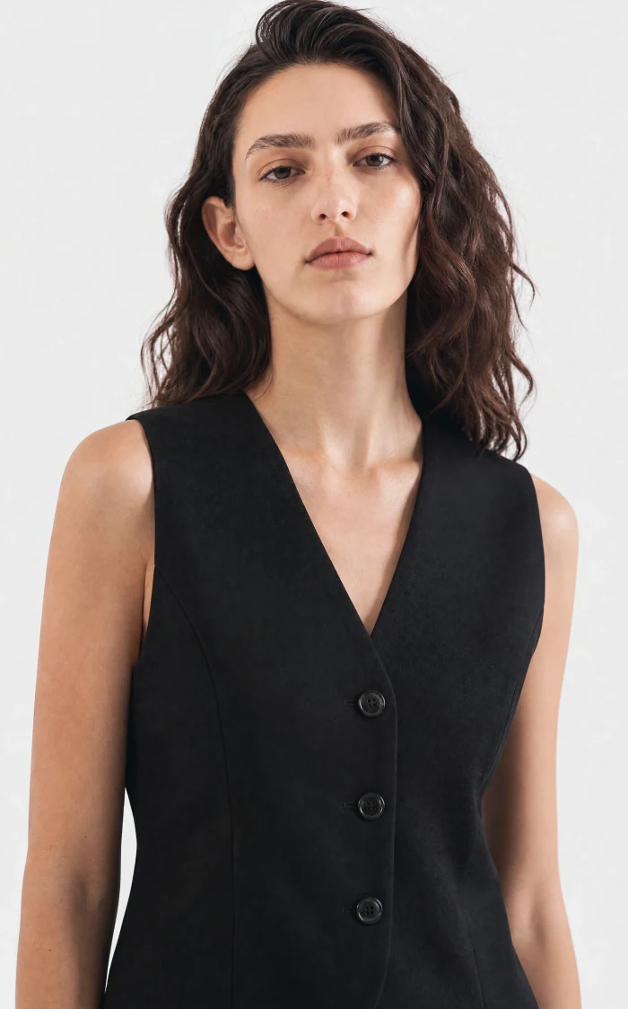 Close-up of the finished image — fabric and buttons hold up