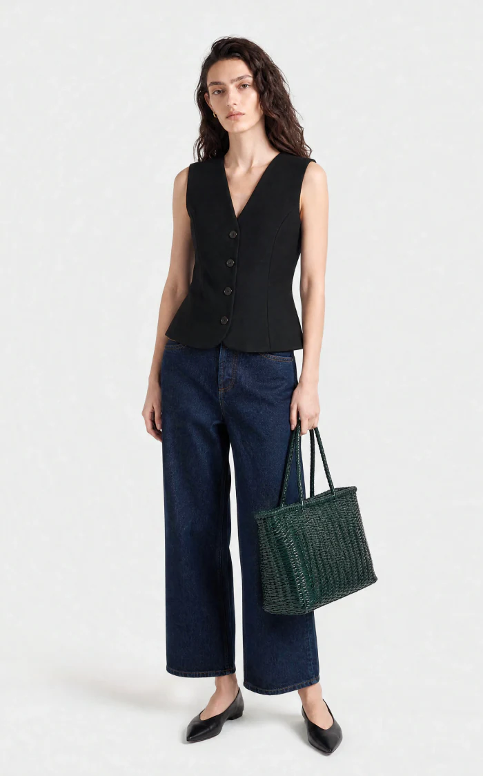 The same black vest generated on an AI fashion model
